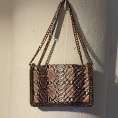 Rose Gold Python Bag Never Used Approx. 22” Chain Strap Rectangular Shoulder Bag With Chain Strap, Square Everyday Bag With Chain Detail, Everyday Rectangular Bag With Chain Strap, Rectangular Bags With Gold Chain For Daily Use, Square Bags With Chain For Everyday Use, Gold Chain Crossbody Shoulder Bag, Daily Use Shoulder Bag With Gold Chain, Everyday Square Flap Bag With Chain Strap, Square Clutch With Chain Strap For Everyday Use