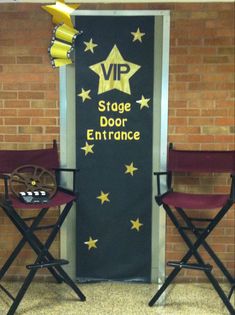 two red chairs sitting in front of a door with the words stage door entrance on it