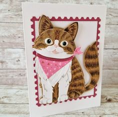 a close up of a card with a cat on it