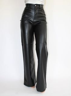 PRODUCT DETAILS Introducing our High Rise Vibrant Vegan PU Leather Flare Pants, where style meets sustainability for a look that's both fashion-forward and environmentally conscious. Crafted from premium vegan leather, these pants offer the luxe appeal of leather without harming animals, making them a guilt-free addition to your wardrobe. With a high-rise waist, these pants provide a flattering and comfortable fit, accentuating your curves while elongating your silhouette. The sleek design creat Leather Flare Pants, Birthday Shoot, 17th Birthday, Environmentally Conscious, Wide Pants, Guilt Free, Flare Pants, Set Dress, Sleek Design