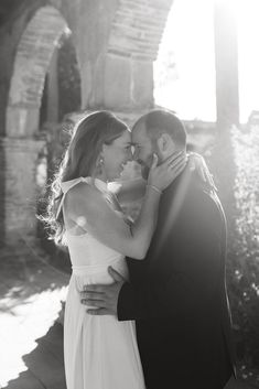 black and white photograph of a couple embracing each other