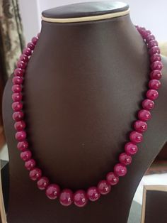 Ruby Necklace Natural Ruby Corundum Smooth Round Beads 501 Carat Ruby Necklace 1.Ruby Corundum 2. Ruby Round Beads 3. 18 inches length, 1 Line String 4. 501 -carat weight 5. 12x12 - 9x9 mm stone size Polish :- Handmade Purity :- AAA These natural Ruby gemstones can be used to make different jewellery items like earrings, bracelets and others. They have a great shine to them and makes a great gift for your loved ones. Click below to see live stock: https://www.etsy.com/au/shop/ShakugemsStore?ref= Ruby Necklace, Ruby Gemstone, Natural Ruby, Round Beads, Necklace Etsy, Ruby, Beaded Necklace, Great Gifts, Gemstones