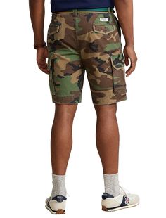 A casual essential for warmer days, these surplus-inspired cargo shorts from Polo Ralph Lauren are cut for a comfortable fit. The classic fit style sits at the waist and is eased through the legs. They're finished with a “Polo RL Brand” patch above the right back pocket.100% cottonBelt loopsZip fly with button closureSide pockets; cargo pockets; back button-through welt pockets“Polo RL Brand” label above the back right pocketXL Sizes have a 10¼" inseam; XLT Sizes have an 11¼" inseam; Size 46W ha Camouflage Military Cotton Shorts, Military Camouflage Cotton Shorts, Camouflage Cotton Cargo Shorts With Side Pockets, Camouflage Cotton Cargo Shorts, Utility Camouflage Cotton Cargo Shorts, Military Style Camouflage Cotton Cargo Shorts, Camouflage Cotton Cargo Shorts With Pockets, Casual Camouflage Cotton Cargo Shorts, Military Style Cotton Cargo Shorts