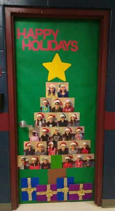 a christmas tree made out of photos on the door to a school classroom building with holiday decorations