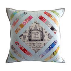 a decorative pillow made with patchwork and ribbon trimmings, featuring the name gamle on it