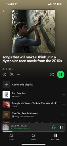 an iphone screen showing the music player's playlist for movies and video games