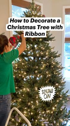 a young boy decorating a christmas tree with the words how to decorate a christmas tree with ribbon