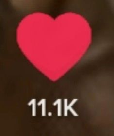 a red heart with the number 11 1k on it