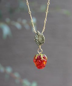 Hand blown glass raspberry necklace with a leaf bail is beautiful and cute. Life-sized flame work glass raspberry is good enough to fool your eye.  Metal:  - 14k gold filled - .925 silver - custom made brass bail with the opening 9 x 4 mm. The raspberry beads are  - medium 15-16 mm - large 17 - 18 mm The pendant is about 34- 38mm including the leaf bail. You can purchase the charm without the chain.  This necklace will make a very surprising gift. Be sure to check out all of my fabulous item and I will be happy to combine the shipping for you.  Join our community and sign up to receive the notifications about new products, sales and special events. https://stylingbynatasha.aweb.page/ Raspberry Necklace, Inspiration Tattoos, Dope Jewelry, Funky Jewelry, Jewelry Lookbook, Fantasy Jewelry, Girly Jewelry, Leaf Pendant, Good Enough