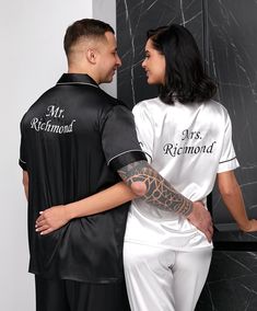 Mr and Mrs Custom Satin Pijamas, Personalized Pajamas for Couple, Wedding pjs, Groom and Bride Pajamas, Honeymoon/Anniversary gift- L+L 🌟About🌟     Satin is a popular fabric for couples' pajamas because it feels soft and silky against the skin. It also has a luxurious sheen that can add an elegant touch to your sleepwear.     Satin pajamas for couples come in a variety of colors and patterns to suit your taste. You might find classic black, white, or navy sets, or you might opt for something m Wedding Pjs, Bride Pajamas, Couple Honeymoon, Suit Prom, Bride Pajama, Bride Suit, Couple Jacket, Groom And Bride, Satin Pajama Set