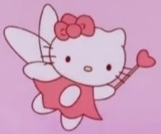 the hello kitty fairy is holding a heart