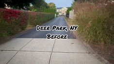 the words deer park, ny before are written in black and white on a street