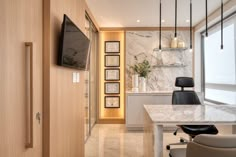 an office with marble counter tops and chairs