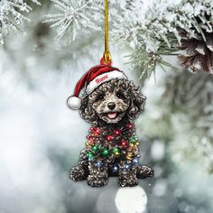 a christmas ornament with a poodle wearing a santa hat hanging from a tree