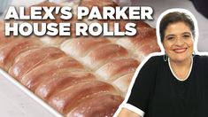 a woman standing in front of a baking pan filled with bread rolls and the words alex's parker house rolls