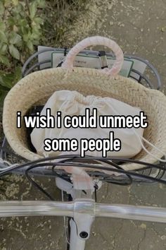 a basket on top of a bike with the words i wish i could unmet some people