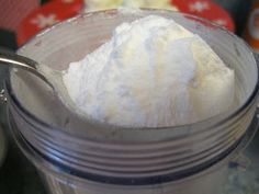 a jar filled with white powder sitting on top of a table