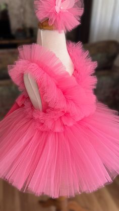 🌸 Discover our Magical Pink Tutu Dress—perfect for babies and toddlers! 🌸

Our Pink Tulle Dress is a delight for first birthdays, Halloween, festivals, special events, and as a charming toddler costume.

👑 Ultimate Comfort: Soft tulle outside, cotton-lined inside to avoid irritation—pure comfort for your little fairy.

🌟 Perfect Fit: With adjustable straps and elastic waist, it's customizable for a snug and comfy fit.

💖 Crafted with Love: Made with care, this fairy dress is a standout piece.

🌈 Key Features:
🎈 Premium Quality: Luxurious, durable fabrics.
🎈 Growth-Friendly: Adjustable features accommodate growth.
🎈 Easy Care: Cold water wash for lasting beauty.

Order now and let your little one dazzle as the star of her special day! 💫 Pink Tutu Dress, Pink Tulle Dress, Dress For Baby, Dress Birthday, Toddler Costumes, Pink Tutu, Birthday Tutu, Pink Tulle, Fairy Dress