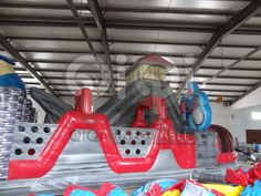 an inflatable slide is set up inside a building