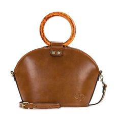 Patricia Nash Mellini New Dome Satchel Tan Color. Style: Mellini Circular Handles, Zip Closure, Rear Zip Pocket, Adjustable Strap Lined Interior With Zip Pocket, Two Slip Pockets Measures 12"L X 11-3/4"W X 4-1/4"H With A 21" To 24" Strap Drop And 4-1/2" Handle Drop; Weighs 1 Lb, 1 Oz Content: 100% Leather; Lining 100% Man-Made Imported Brown Shoulder Bag With Bamboo Handle, Crossbody Tote Bag, Black Leather Purse, Coin Bag, Black Leather Bags, Black Shoulder Bag, Satchel Purse, Crossbody Tote, Satchel Handbags