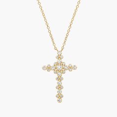 Equally meaningful and beautiful, this diamond cross necklace is handcrafted in 14k gold for frequent wear. Treat yourself or a loved one to this sparkling symbol of faith. Formal Yellow Gold Diamond Cross Necklace, Yellow Gold Diamond Cross Necklace, Elegant Yellow Gold Cross Pendant Diamond Necklace, Yellow Gold Cross Pendant Jewelry With Diamond Accents, Cross-shaped Yellow Gold Diamond Necklace, Wedding Ring Guide, Pearl Jewelry Gift, Pearl Bracelet Gold, Platinum Rose Gold