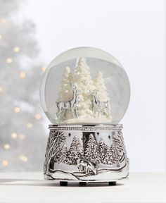 a snow globe sitting on top of a table