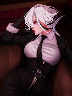 a woman with white hair wearing a suit and tie sitting on a couch in a dark room