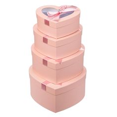 a stack of pink boxes sitting on top of each other