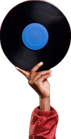 a person holding up a record in the air