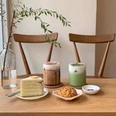 a table topped with plates of food and drinks