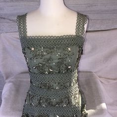 Nwt Asos Beaded Dress Size 8 Seafoam Green Eyelet, Hand Sewn Glass Silver Beads, Pearls, Leaves. Elegant, Lovely Natural Pattern Zip Back, Fully Lined W/ Matching Tulle Overlay. Made In India. Attached Tags W/ Extra Beads And Thread For Typical Replacement Areas. Due To The Delicate Nature Of The Embellishments Trims Extra Care Should Be Taken During Wear. Some Areas Are Missing But It Is Not Overtly Noticeable As You Can See By The Photos. See Pics Of Measurements Please Expand Pics To See Clos Elegant Green Dress With Pearl Embroidery, Beaded Sleeveless Festive Dress, Beaded Sleeveless Dress For Festive Occasions, Fitted Beaded Lace Dresses, Green Pearl Embroidery Party Dress, Green Beaded Dresses For Spring, Sleeveless Beaded Festive Dress, Spring Green Beaded Dress, Vintage Green Embellished Dress