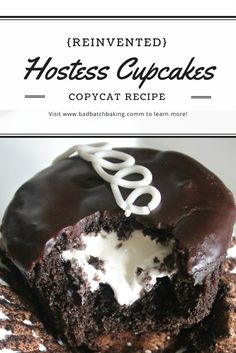 a close up of a chocolate cake with white frosting on top and the words, reinvented hostess cupcakes copycat recipe