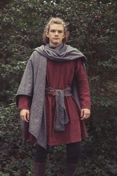 This cloak gives you the feeling of standing on an Irish cliffside at dawn. But the chilly wind of Ireland is best enjoyed in warmth! The Ruana cloaks are made in the traditional style with an amazing selection of beautiful wool fabrics to keep you warm and dry as you listen to crashing waves. *Please note that our wool fabric comes from small dye batches, colors may vary due to screen settings.* Exchange/Return Policy Complete the look with Pose Wigs! She is wearing Bloom True Silver - Lace Fro Traditional Winter Outerwear For Outdoor, Traditional Winter Outdoor Outerwear, Medieval Long Sleeve Cape For Larp, Medieval Style Fall Cape Outerwear, Medieval Style Fall Cape, Medieval Style Winter Cape For Larp, Medieval Winter Cape For Larp, Medieval Style Winter Cape Outerwear, Medieval Winter Cape Outerwear