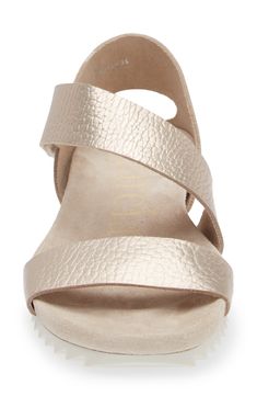 Tough with a tender side, this sporty sandal is handcrafted with a serrated sole and pebbled leather that's left unlined for greater softness and flexibility. The anatomical wrapped-cork footbed cradles your foot and will feel even more comfortable over time. 1" heel; 3/4" platform (size 8.5US / 38.5EU) 2 1/2" ankle strap Adjustable hook-and-loop ankle strap Cushioned footbed with arch support Leather upper and lining/synthetic sole Made in Spain Sporty Sandal, Strappy Wedges, Platform Wedge Sandals, Wedge Sandal, Platform Wedges, Arch Support, Pebbled Leather, Wedge Sandals, Ankle Strap