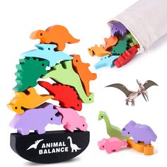 an animal balance game with dinosaurs and birds on it's back side, in front of a white background