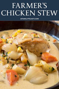 chicken stew with carrots, corn and potatoes in a black bowl