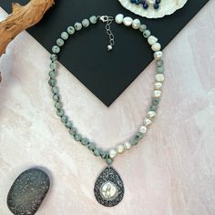 "Druzy Pearl Pendant, suspended from a Kiwi Jasper with sections of baroque pearls Necklace. Necklace Length: 17-18\" L. Pendant Dimension: 2\" L, 1.5 W. Major Bead/ Material: 8mm round-shape matte Kiwi Jasper, 9-10mm freshwater baroque pearl, Tear-Shape Druzy Pearl Pendant.  Clasp and Extender: sterling silver lobster claw clasp and extender. https://www.etsy.com/shop/MYGEMSROCK" Bohemian Pearl Pendant Necklace, Bohemian Beaded Necklaces With Pearl Pendant, Baroque Pearls Necklace, Kiwi Jasper, Jasper Necklace, Jasper Beads, Beaded Material, Pearl Pendant Necklace, Heart Chakra