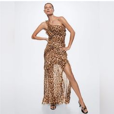 Mango- Be Sexy, Elegant And Bold In This Beautiful, Feminine With Ruffles And Super Trendy Animal Print Long Gown. This Show Stopper Is Flowy, Asymmetrical, Has One Shoulder, Is Sheer And Lined. Perfect For A Wedding Or Any Other Formal/Semi Formal Event. Wear With Red Heals To Complete The Look. Runs Small In Chest And Hip Area. 100% Polyester Printed Long Gowns, Mango Dresses, Long Gown, Semi Formal, Formal Event, Ruffles, Animal Print, One Shoulder, Mango