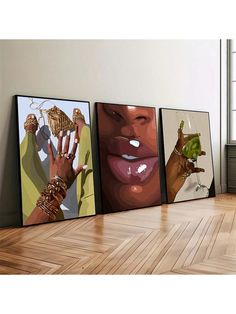 three paintings on the wall in an empty room with wooden floors and hard wood flooring