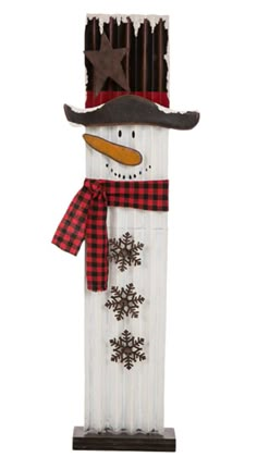 a wooden snowman with a hat and scarf