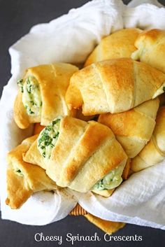 cheesy spinach crescents in a basket