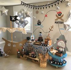 a pirate themed birthday party with balloons and decorations