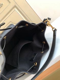 Size: 23.0cm*23.0cm*16.0cm It comes with Dust box, Care manual, Tag, and Paper bag. High-end Black Pouch Satchel, Designer Bucket Bag With Detachable Strap, High-end Bucket Satchel With Detachable Handle, High-end Bucket Bag With Top Carry Handle, High-end Satchel With Bucket Shape And Detachable Handle, High-end Bucket Satchel For Travel, High-end Travel Bucket Satchel, Designer Satchel Bucket Bag For Office, Luxury Bucket Satchel With Removable Pouch