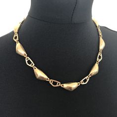 "This is: An original vintage signed Monet necklace from the 50s/60s. Goldtone geometric 3d links which lie flat like a collar. Lovely quality item with a good weight to it. Great for layering or as a single statement piece. 18\" length Please see pics for size/weight/condition. I accept all returns - if you are not happy with your item, please message me before leaving feedback and I will be happy to deal with your concerns. I try my best to be as accurate as possible in my listings, but occasionally I will make a genuine mistake and will rectify it very quickly, just let me know, thanks." Vintage Metal Chain Necklace For Evening, Vintage Metal Choker For Formal Occasions, Formal Vintage Metal Choker, Vintage Metal Choker For Evening, Vintage Metal Evening Choker, Retro Metal Necklace For Evening, Retro Chain Necklace For Formal Occasions, Retro Formal Jewelry With Chain Detail, Retro Formal Chain Necklace