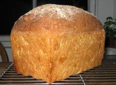 a loaf of bread sitting on top of a cooling rack