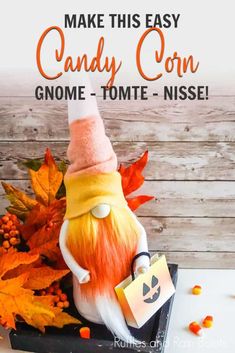 an easy candy corn gnome is sitting on top of some candy