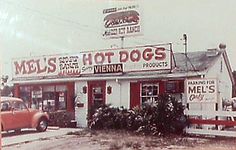 an old photo of a hot dog restaurant