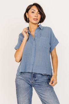 Blue Collared Top With Roll-up Sleeves, Blue Shirt With Roll-up Sleeves And Shirttail Hem, Washed Blue Cotton Blouse With Button Closure, Light Blue Casual Top With Placket, Casual Light Blue Top With Placket, Blue Collared Top With Pockets, Collared Denim Blue Blouse With Pockets, Blue Top With Pockets And Collared Neckline, Denim Blue Cotton Blouse With Pockets