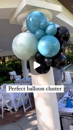 balloons are stacked on top of each other at an outdoor event with the words perfect balloon clusterer above them