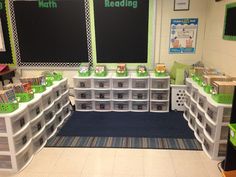 a classroom with lots of bins filled with books